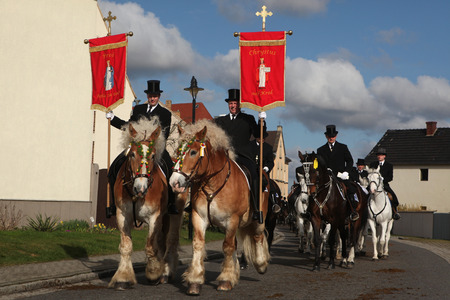 RALBITZ, GERMANY - APRIL 8, 2012: Easter Riders attend the Easter ceremonial equestrian procession...