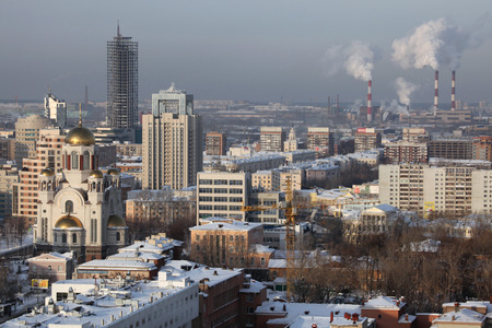 YEKATERINBURG, RUSSIA - JANUARY 5, 2011: Church of All Saints on the Blood (L) in Yekaterinburg, Russia, pictured from the viewing point at the Antei Skyscraper.のeditorial素材