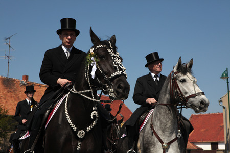 CROSTWITZ, GERMANY - APRIL 24, 2011: Easter Riders attend the Easter ceremonial equestrian procession in the Lusatian village of Crostwitz near Bautzen, Upper Lusatia, Saxony, Germany.のeditorial素材