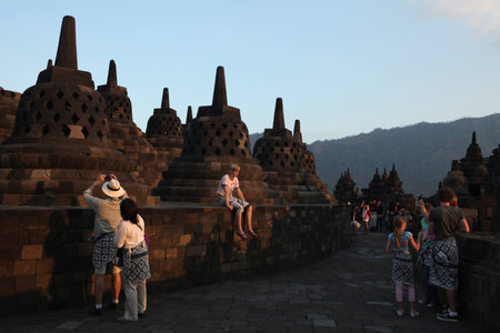 MAGELANG, INDONESIA - AUGUST 1, 2011: Tourists visit the Borobudur Temple in Magelang, Central Java, Indonesia.のeditorial素材