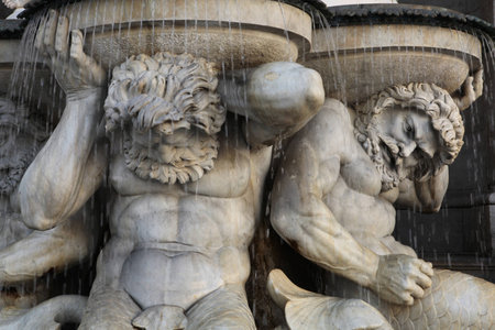 Muscular Tritones support the Danube Fountain or the Albrecht Fountain (1869) by Austrian sculptor Johann Meixner in front of the Albertina Museum in Vienna, Austria.のeditorial素材