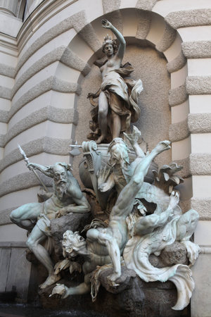 Fountain the Power of the Sea (1893) by Austrian sculptor Rudolf Weyr at Michaelerplatz near the Hofburg Palace in Vienna, Austria.のeditorial素材