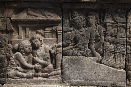 Stone bas relief from the Prambanan Temple near Yogyakarta, Central Java, Indonesia.の写真素材