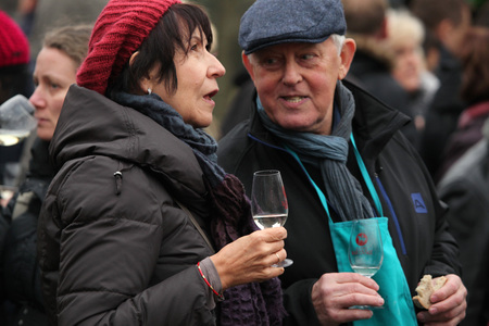 PRAGUE, CZECH REPUBLIC - NOVEMBER 11, 2012: Elderly couple tastes young wine during the celebration of Saint Martin Day in Prague, Czech Republic.のeditorial素材