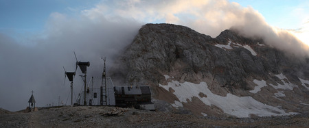 TRIGLAV, SLOVENIA - SEPTEMBER 1, 2011: Triglavski Dom na Kredarici mountain hut (2,515 m) at the foot of Mount Triglav (2,864 m) in the Julian Alps, Slovenia.のeditorial素材
