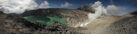 Acid lake in the crater of the active volcano of Kawah Ijen in East Java, Indonesia.の写真素材