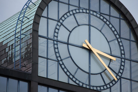 Huge clock on the postmodernist office building on Wenceslas Square in Prague, Czech Republic.の写真素材