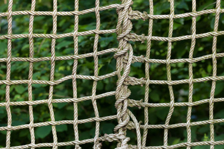 Net braided from ropes. Background texture.