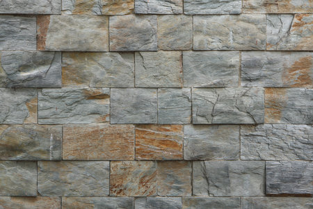 Stone facade tiles. Background texture.