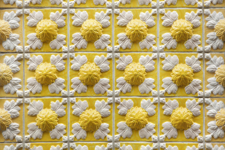 Traditional Portuguese azulejo tiles on the building in Porto, Portugal. Background texture.の写真素材