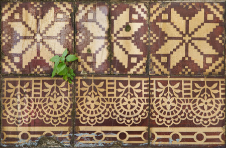 Traditional Portuguese azulejo tiles on the building in Porto, Portugal. Background texture.