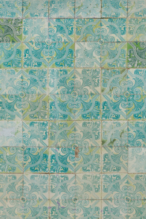 Traditional Portuguese azulejo tiles on the building in Lisbon, Portugal. Background texture.の写真素材