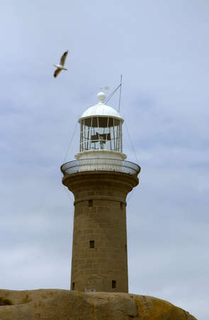 Historic Granite Lighthouse on islandの写真素材