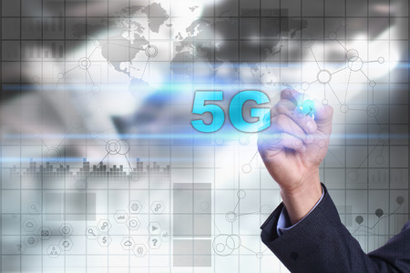 Businessman is drawing on virtual screen. 5g concept.の写真素材