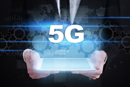 Businessman holding tablet PC with 5g concept.の写真素材