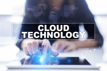 Woman is using tablet pc, pressing on virtual screen and selecting cloud technology