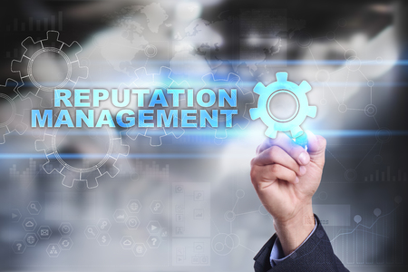 Businessman is drawing on virtual screen. reputation management concept.の写真素材