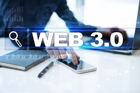Businessman working in office, pressing button on virtual screen and selecting web 3.0.の写真素材