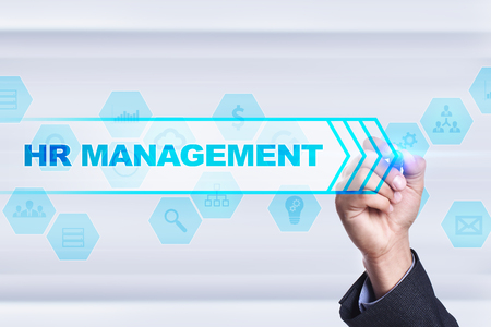 Businessman drawing on virtual screen. hr management concept.の写真素材