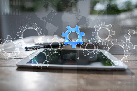 Gears on virtual screen. Business strategy and technology concept. Automation process.の写真素材