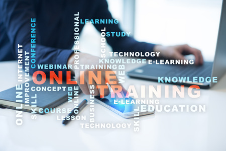 Online training on virtual screen. Education concept. Words cloud.の写真素材