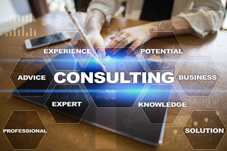 Consulting business concept. Text and icons on virtual screen.の写真素材