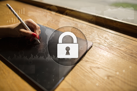 Cyber security, Data protection, information safety and encryption. internet technology and business concept.  Virtual screen with padlock icons.の写真素材