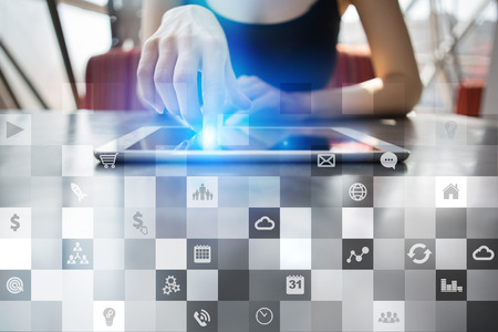 Business mockup. Office workflow. Icons on virtual screen. Internet and digital technology concept.の写真素材