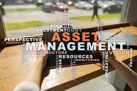 Asset management on the virtual screen. Business concept. Words cloud.の写真素材