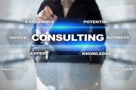 Consulting business concept. Text and icons on virtual screen.の写真素材