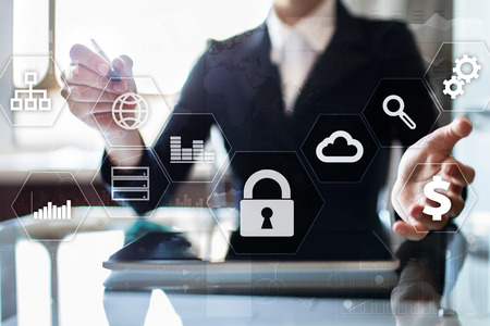 Data protection, Cyber security, information safety and encryption. internet technology and business concept.  Virtual screen with padlock icons.の写真素材