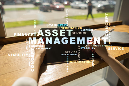Asset management on the virtual screen. Business concept. Words cloud.の写真素材