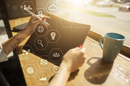 Business and technology concept. Graphs and icons on virtual screen.