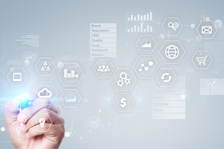 Business and technology concept. Graphs and icons on virtual screen background.