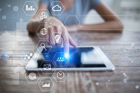 Business and technology concept. Graphs and icons on virtual screen.の写真素材