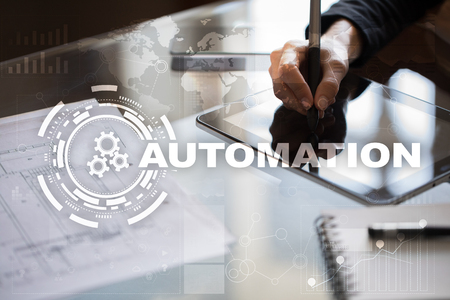 Automation concept as an innovation, improving productivity, reliability and repeatability in technology and business processes.の写真素材