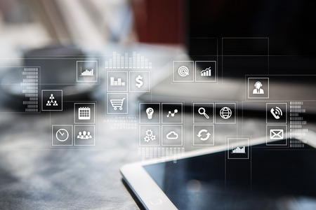 Virtual screen interface with applications icons. APPS. Work Business process in modern office. Strategy planning  Internet technology concept.の写真素材