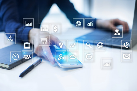 Virtual screen interface with applications icons. APPS. Work Business process in modern office. Strategy planning  Internet technology concept.の写真素材
