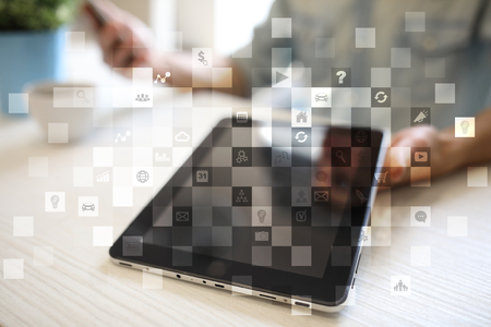 Virtual screen interface with applications icons. APPS. Work Business process in modern office. Strategy planning  Internet technology concept.の写真素材