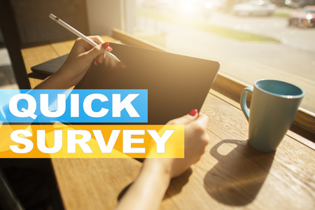 Quick survey text on virtual screen. Feedback and customers testimonials. Business internet and technology concept.の写真素材