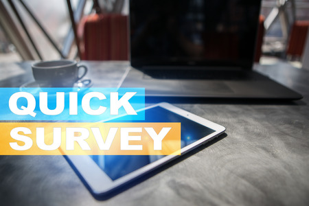 Quick survey text on virtual screen. Feedback and customers testimonials. Business internet and technology concept.の写真素材