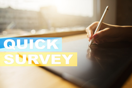 Quick survey text on virtual screen. Feedback and customers testimonials. Business internet and technology concept.の写真素材