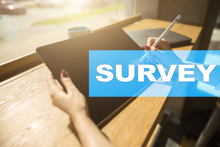 Survey text on virtual screen. Feedback and customers testimonials. Business internet and technology concept.の写真素材