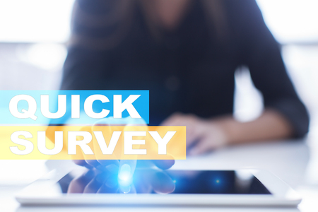 Quick survey text on virtual screen. Feedback and customers testimonials. Business internet and technology concept.の写真素材