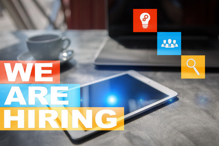 We are hiring text on virtual screen. Recruitment. HR. Human resources management. Business concept.