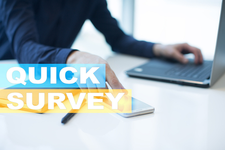 Quick survey text on virtual screen. Feedback and customers testimonials. Business internet and technology concept.の写真素材