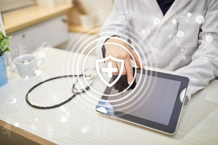 Medical concept on virtual screen. Healthcare. Online medical consultation and health check, EMR, EHR.の写真素材