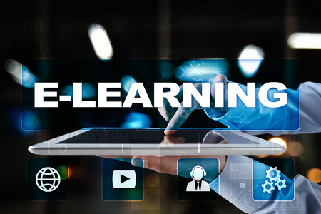 E-Learning on the virtual screen. Internet education concept.の写真素材