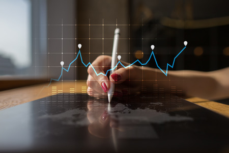 Diagrams and graphs on virtual screen. Business strategy, data analysis technology and financial...