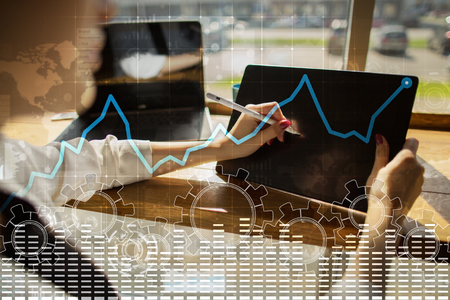 Data analysis graph on virtual screen. Business finance and technology concept.の写真素材